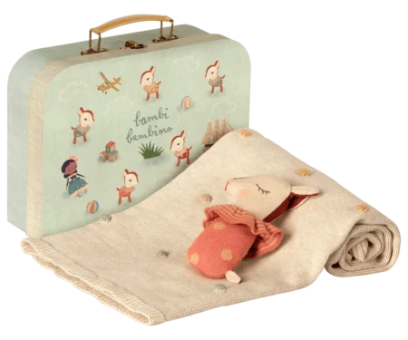 М'яка іграшка бембі у валізі